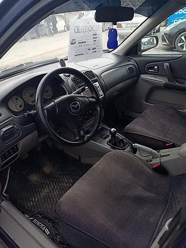 infinity fx: Mazda 323: 2002 г., 1.6 л, Ручные, Бензин, Хэтчбэк — 6