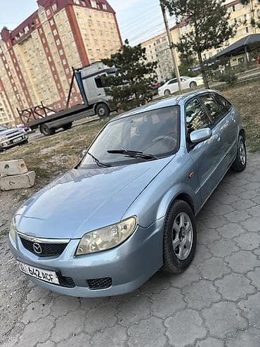 Продажа авто: Mazda Familia: 2002 г., 1.6 л, Механика, Бензин, Хэтчбэк — 1