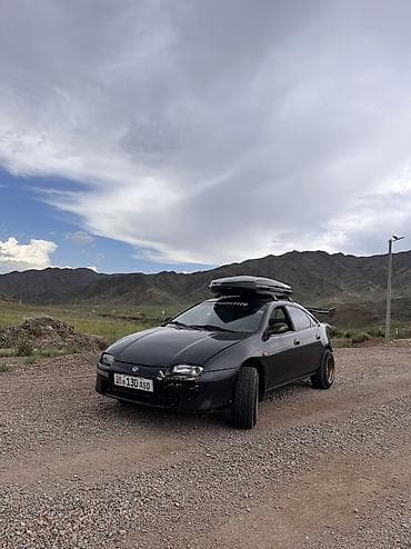 Продажа авто: Mazda 323: 1994 г., 1.5 л, Механика, Бензин, Хэтчбэк — 3