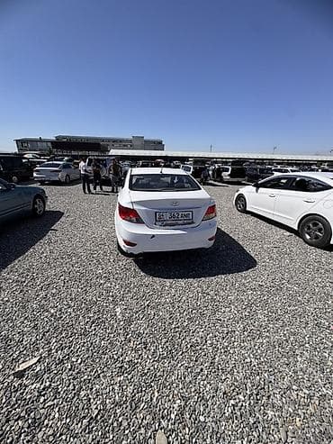 Унаа: Hyundai Solaris: 2013 г., 1.4 л, Кол менен иштөөчү, Бензин, Седан — 3
