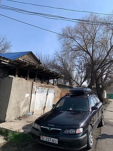 штамп 2107: Mazda 626: 2000 г., 2 л, Механика, Бензин, Универсал — 3