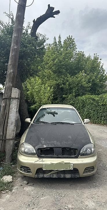 донголок 66: Daewoo Lanos: 2001 г., 1.5 л, Автомат, Бензин, Седан — 2