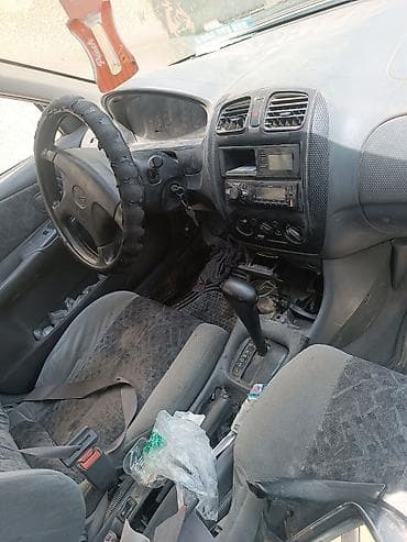 Продажа авто: Mazda 323: 1999 г., 1.6 л, Автомат, Бензин, Хэтчбэк — 4