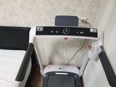 тренажер беговая дорожка для дома цена: Беговая дорожка с компактным дизайном, выполненная в белом и сером — 2