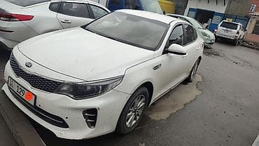 KIA K5 2018 год — аренда. - Кузов: седан, темно‑серый цвет. -