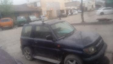 mini cuper: Компактный трёхдверный внедорожник с полным приводом. Темно‑синий — 1