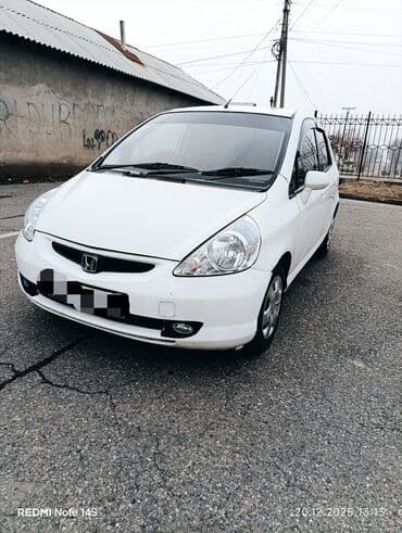 ход: Honda Fit (правый руль), салон и оснащение - Руль справа — 10