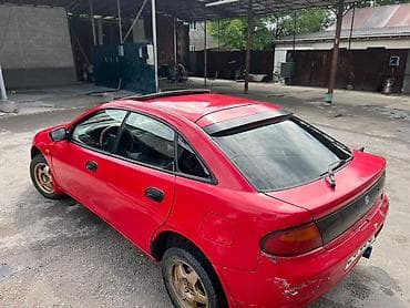 rx 7: Mazda 323: 1997 г., Механика, Бензин — 7