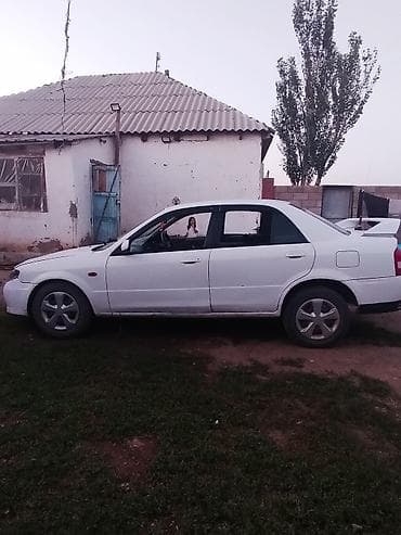Mazda Familia: 2000 г., 1.6 л, Автомат, Бензин, Седан