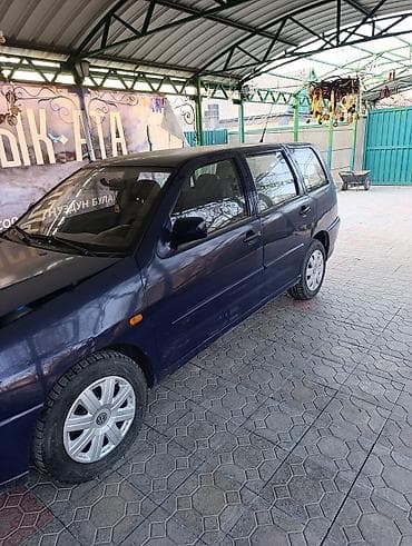 сары булун: Volkswagen Polo: 1999 г., 1.4 л, Кол менен иштөөчү, Бензин, Универсал — 1