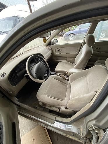 Kia Sephia: 2000 г., 1.8 л, Автомат, Бензин, Седан — 8