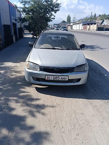 Mazda Familia: 1999 г., 1.5 л, Автомат, Бензин, Универсал
