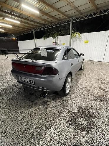 прес ош: Mazda Lantis: 1996 г., 1.5 л, Механика, Бензин, Седан — 3