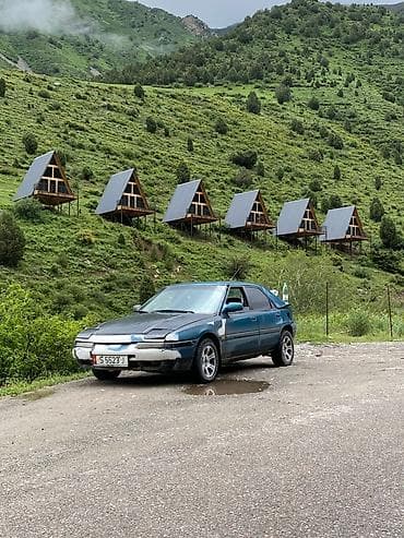 бензин сатылат: Mazda 323: 1994 г., 1.6 л, Кол менен иштөөчү, Бензин, Хетчбек — 5