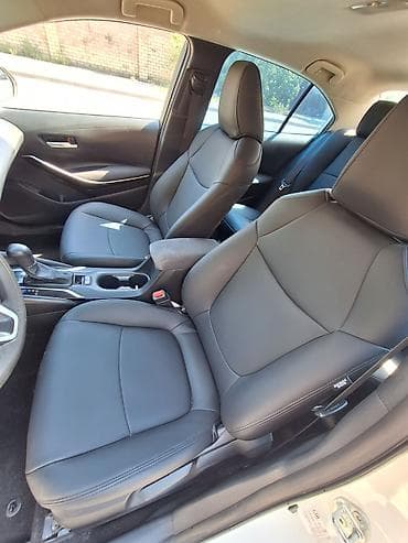 e2 byd: Toyota Corolla: 2022 г., 1.8 л, Вариатор, Гибрид, Седан — 9