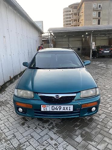 rx 590: Mazda 323: 1996 г., 1.6 л, Автомат, Газ, Седан — 3