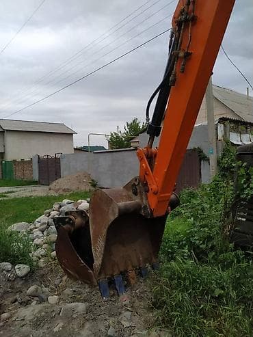 2 2 cdi: Экскаватор, 1997 г., Колесный — 5