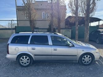 зимнюю резину: Opel Astra: 2004 г., 2 л, Механика, Дизель, Универсал — 4