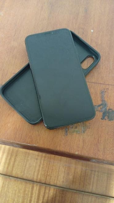 фото: IPhone X, Черный, Чехол, 73 % — 1