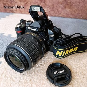 Nikon D40x + Nikkor 18-55 mm + зарядка и батарея (оригинал) В