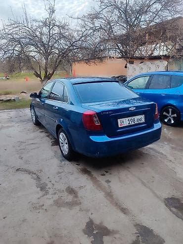 стекло уаз: Chevrolet Lacetti, синий седан год 2006.1.6Механика - Кузов — 1