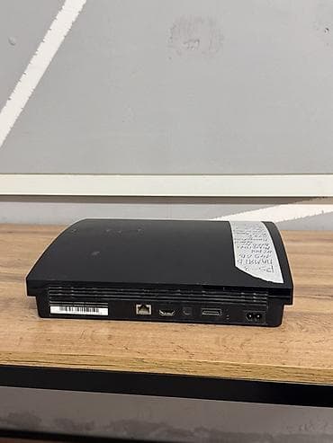 game controller: Sony PlayStation 3 (Slim). Игровая приставка с жёстким диском 149 ГБ — 3