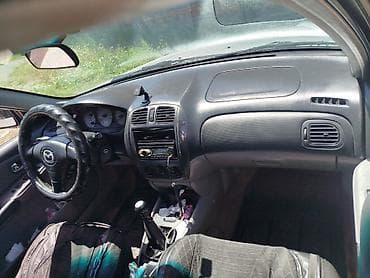 замок матиз замок контака: Mazda 323: 2003 г., 1.6 л, Механика, Бензин — 5