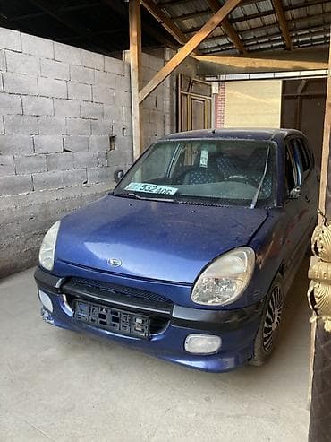 Унаа: Daihatsu Sirion: 2002 г., 1.3 л, Кол менен иштөөчү, Бензин, Хетчбек — 1