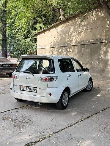 айни 95: Mazda Demio: 2005 г., 1.5 л, Автомат, Бензин — 5