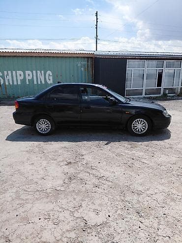 e 303: Kia Spectra: 2007 г., 1.6 л, Седан — 5