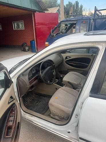 golf 3: Daewoo Nubira: 2001 г., 1.6 л, Механика, Бензин — 5