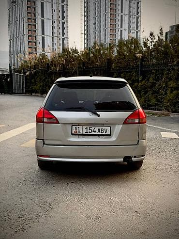 windom 20: Nissan Wingroad: 2004 г., 2 л, Автомат, Универсал — 1