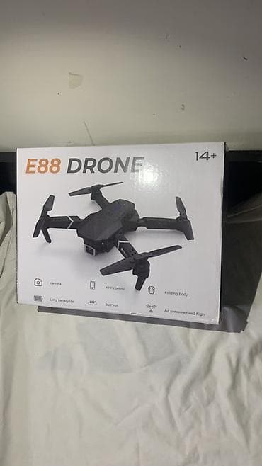 ufc диск: Квадрокоптер E88 DRONE (14+) - Складная конструкция: компактные лучи — 1