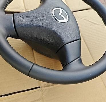 vitis taiota: Руль Mazda 2004 г., Оригинал — 2