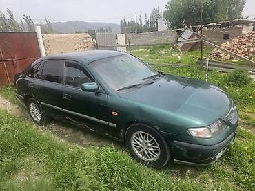 Mazda 626: 2000 г., 0.2 - engine capacity л, Кол менен иштөөчү, Бензин, Хетчбек — 4