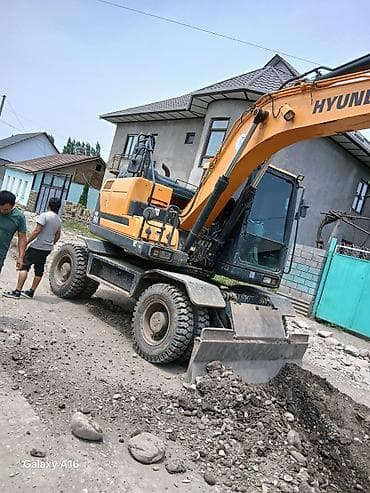 экскватор 145: Экскаватор, Hyundai, Колесный — 3