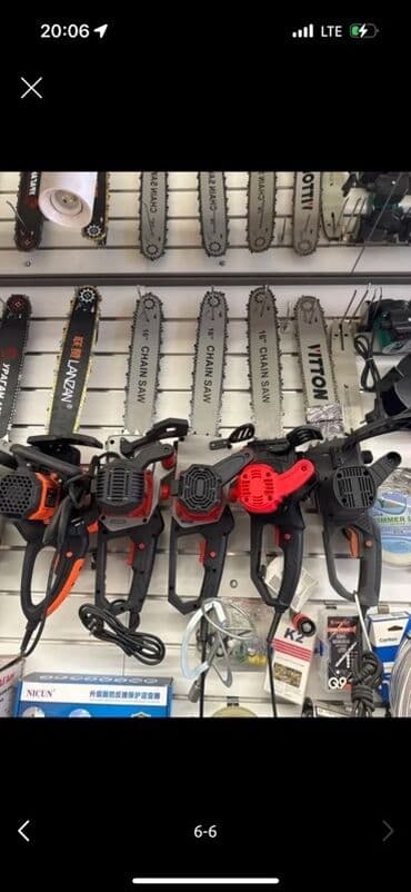 Цепная пила с бензиновым двигателем, предназначенная для распиловки