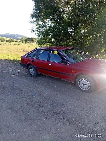 крыло деу матиз: Nissan Bluebird: 1986 г., 2 л, Хэтчбэк — 1