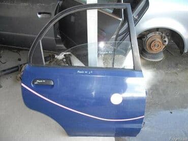 дом машина: Mazda 121 дверь, Мазда 121 задняя правая дверь 1992 г. ЦВЕТ - КРАСНЫЙ — 1