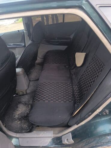 автомобиль форд: Mazda 323: 2003 г., 1.6 л, Механика, Бензин, Хэтчбэк — 6