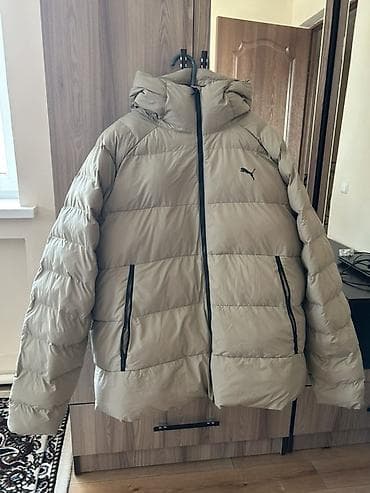 Плащи: Puma пуховик с капюшоном, размер EU XXL (US XXL/CA TTG). Цвет — 1