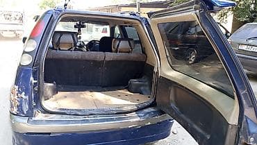 тарзан машина: Toyota Raum: 2000 г., 1.3 л, Автомат, Бензин, Минивэн — 9