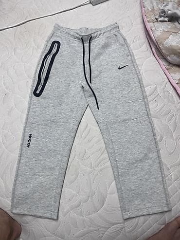 tech fleece: Серые спортивные брюки NOCTA x Nike. - Прямой крой, комфортная — 2
