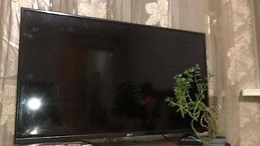 ресивер смарт тв: Смарт‑телевизор LG, диагональ около 43–50". Плоская LED‑панель, тонкие — 4