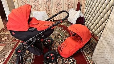 Детский мир: Детская коляска 2 в 1 (люлька + прогулочный блок) ярко‑красного цвета — 1