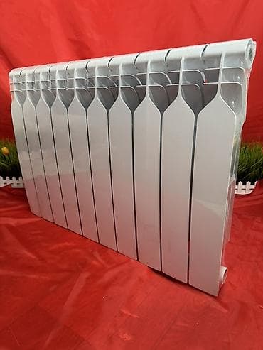 Биметаллический радиатор отопления, 10 секций, цвет белый. -