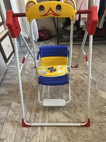 Детские напольные качели - Конструкция: прочная металлическая рама с