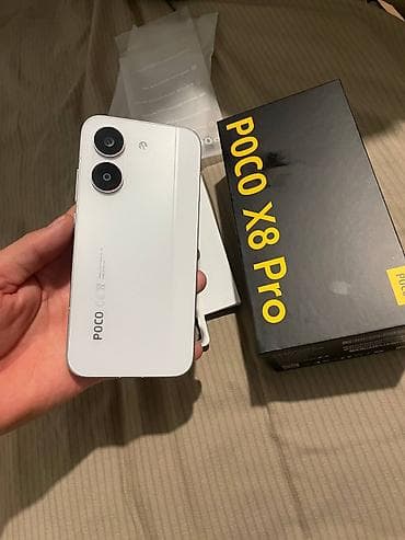 redmi note 14 pro: Смартфон POCO X8 Pro в белом цвете. Устройство выполнено в современном — 1