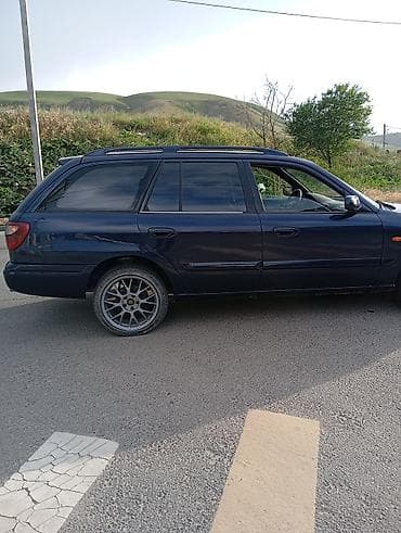 Транспорт: Mazda Capella: 2000 г., Механика, Универсал — 6