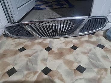 Глушители: Решетка радиатора Daewoo 1999 г., Б/у — 1